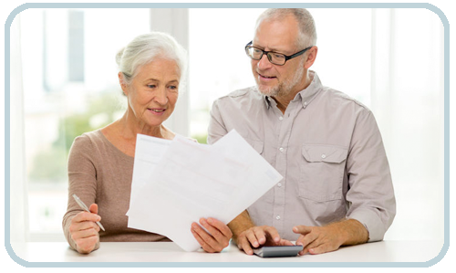 Man and woman reviewing financing options