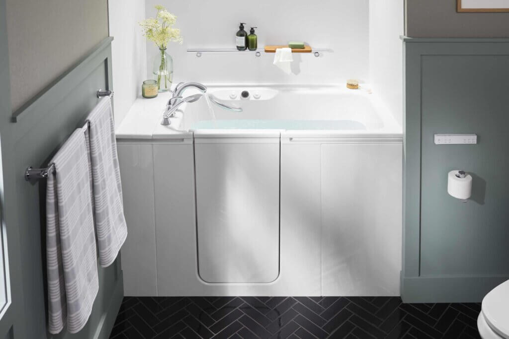 KOHLER walk-in bath filling with water